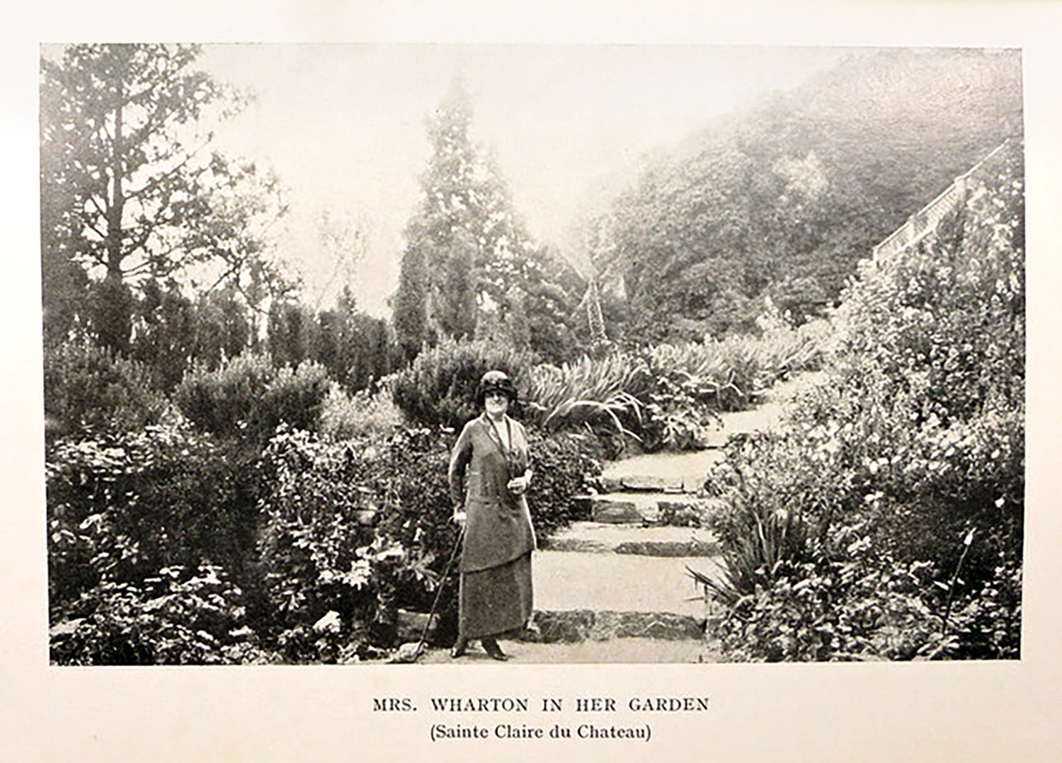 Vintage photograph of Edith Wharton in her garden.